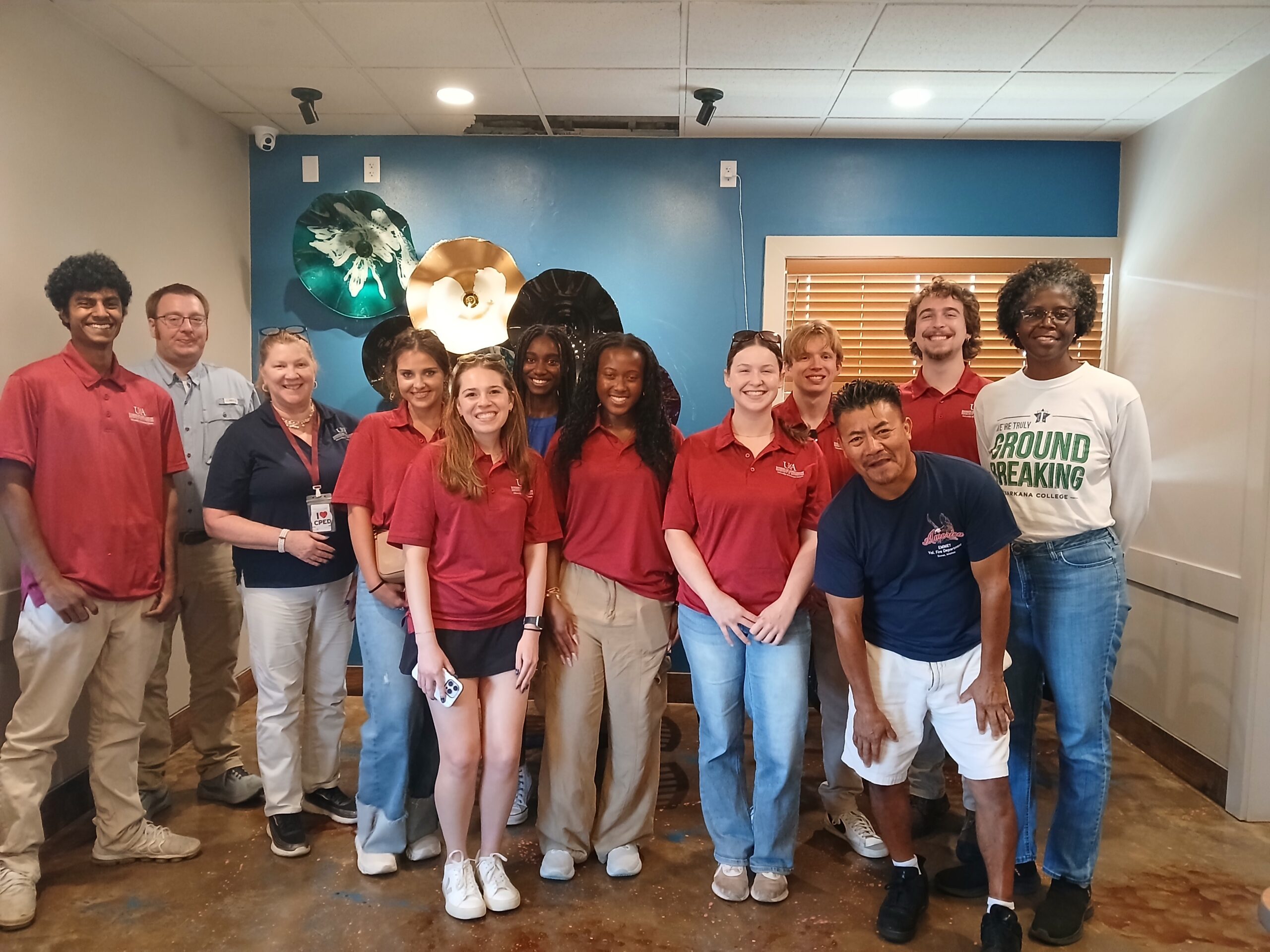 Group of college students and local utility operator